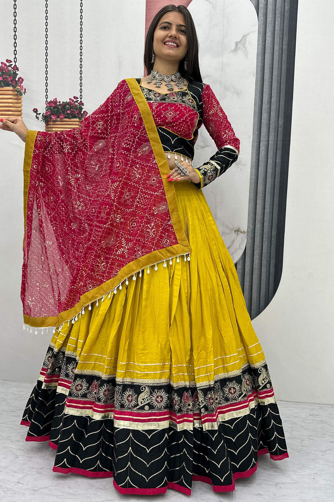 Captivating Yellow Thread Embroidered Cotton Navratri Lehenga Choli