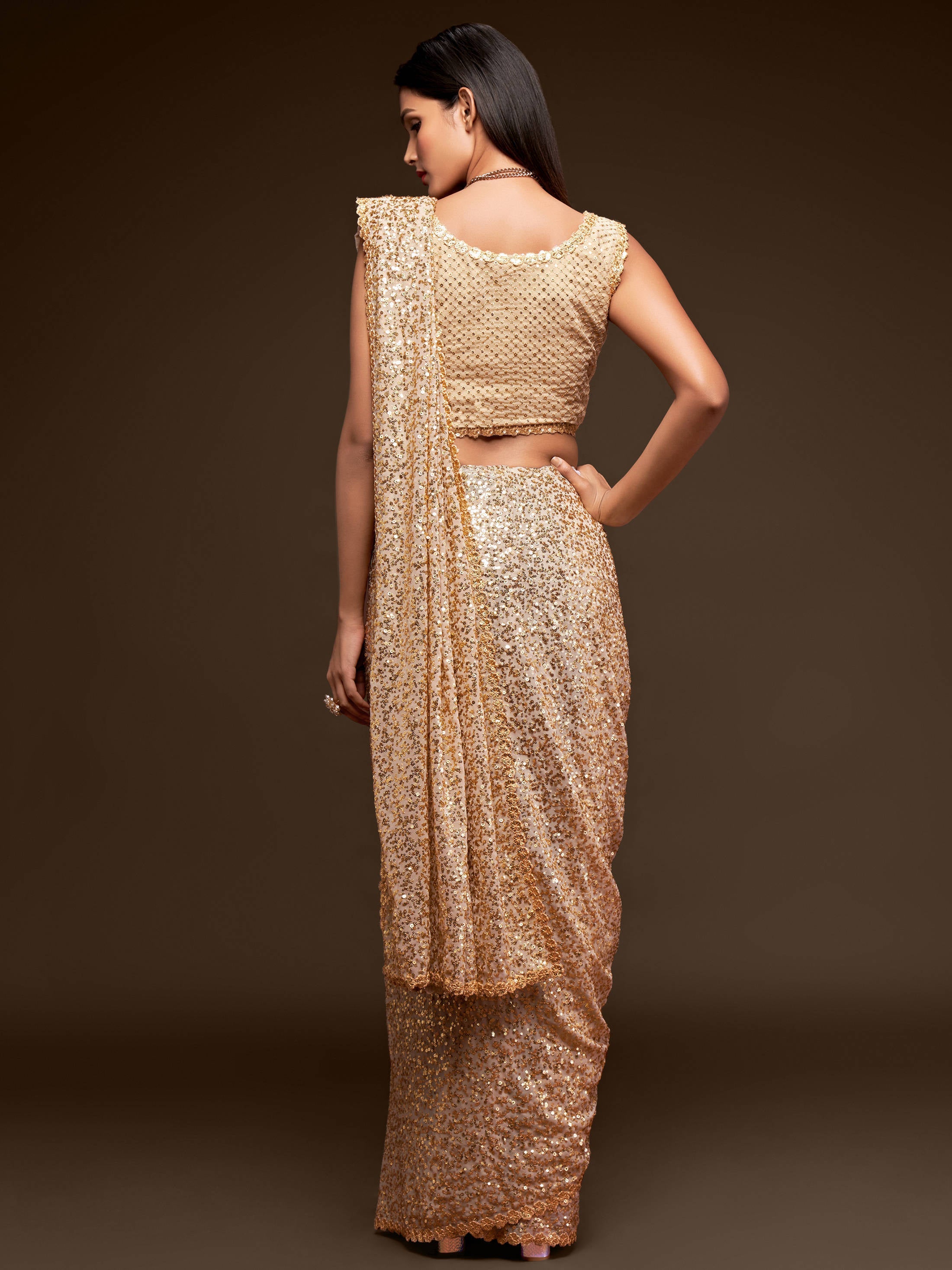 Awsome Ivory Sequined Georgette Party Wear Saree
