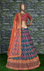 Flamboyant Blue-Red Colored Bridal wear Embroidered Lehenga CholiFlamboyant Blue-Red Colored Bridal wear Embroidered Lehenga Choli