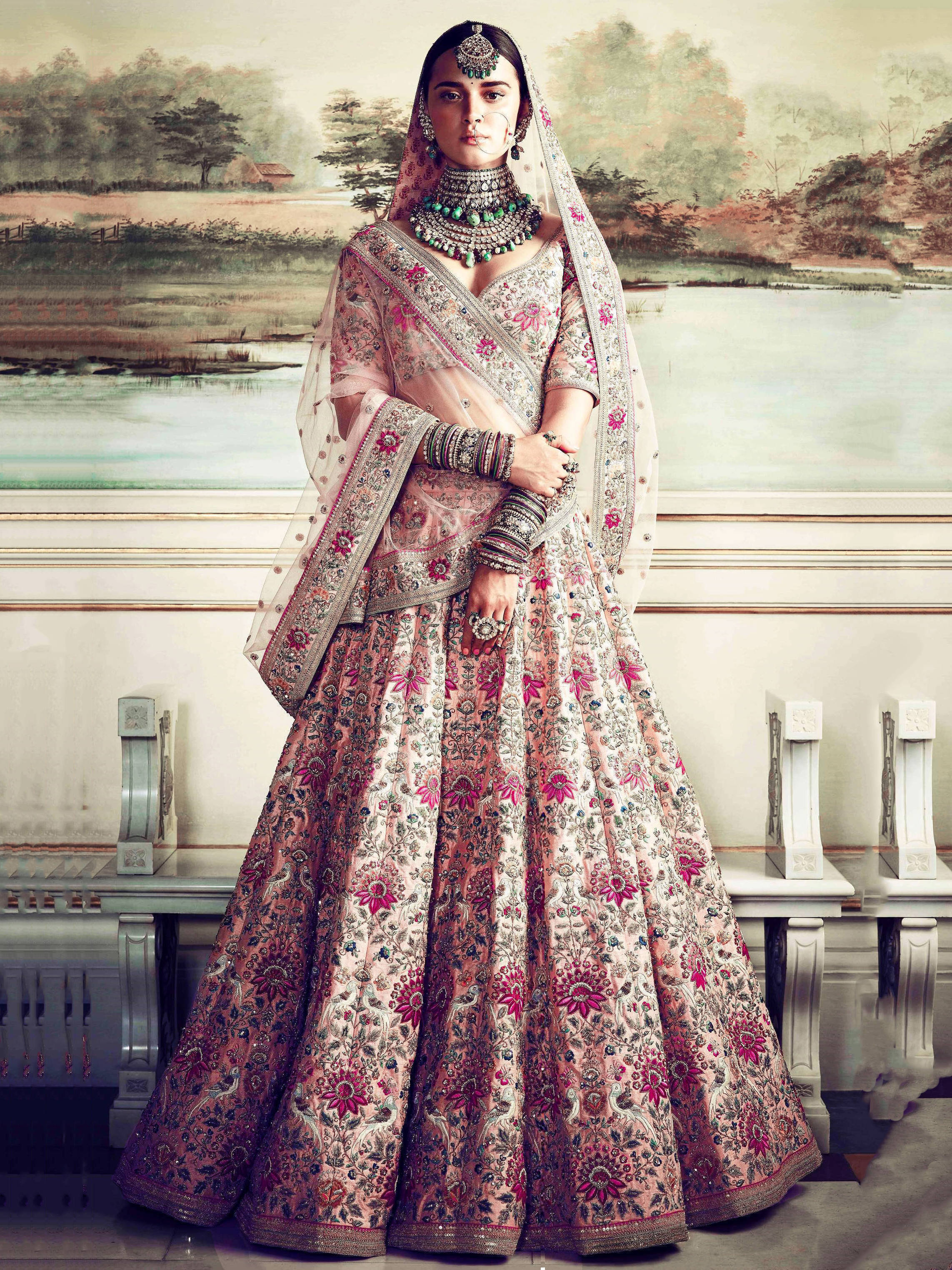 Buy Prominent peach Colored Bridal wear Embroidered Lehenga Choli