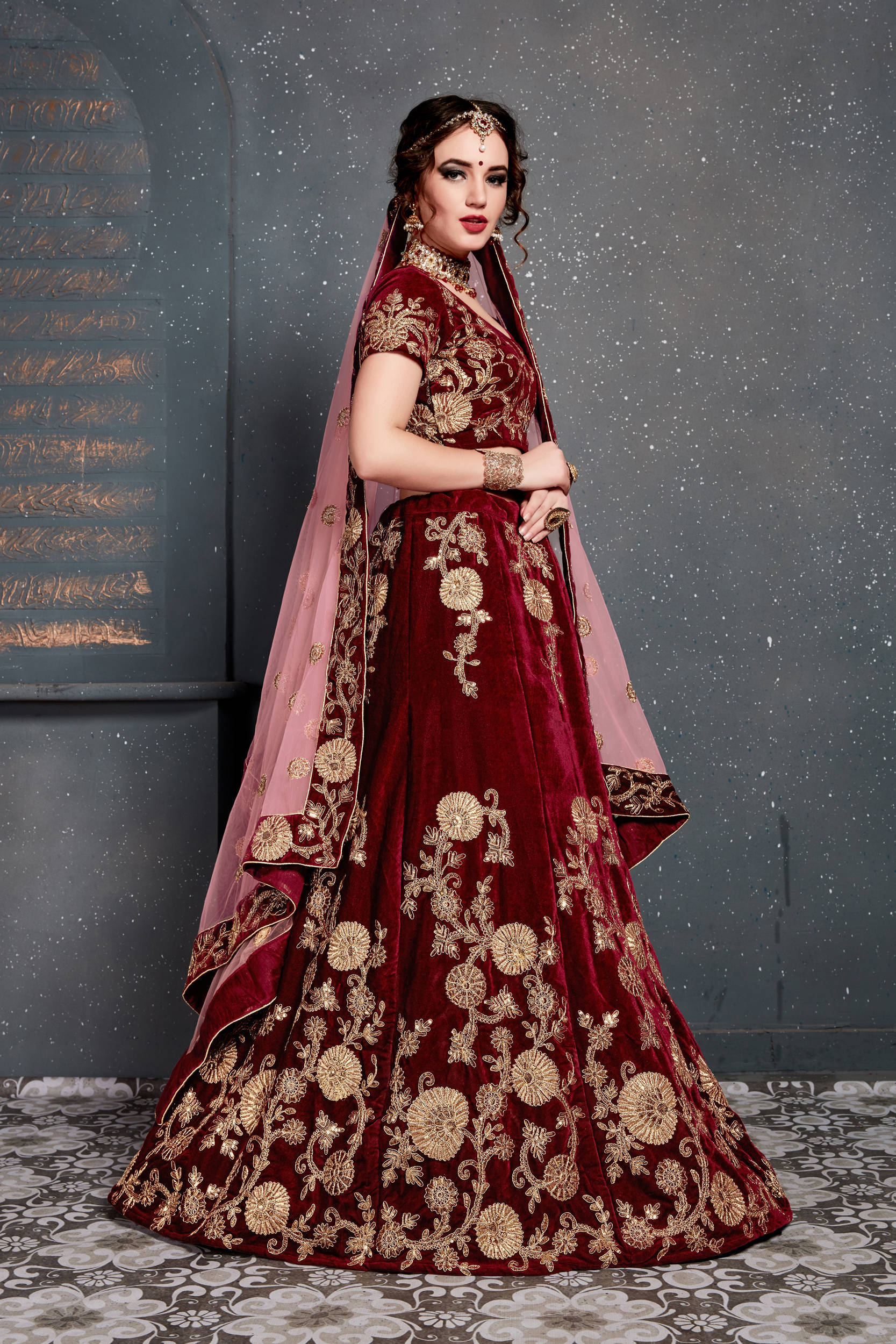 Innovative Maroon Bridal Wear Embroidered Velvet Lehenga Choli