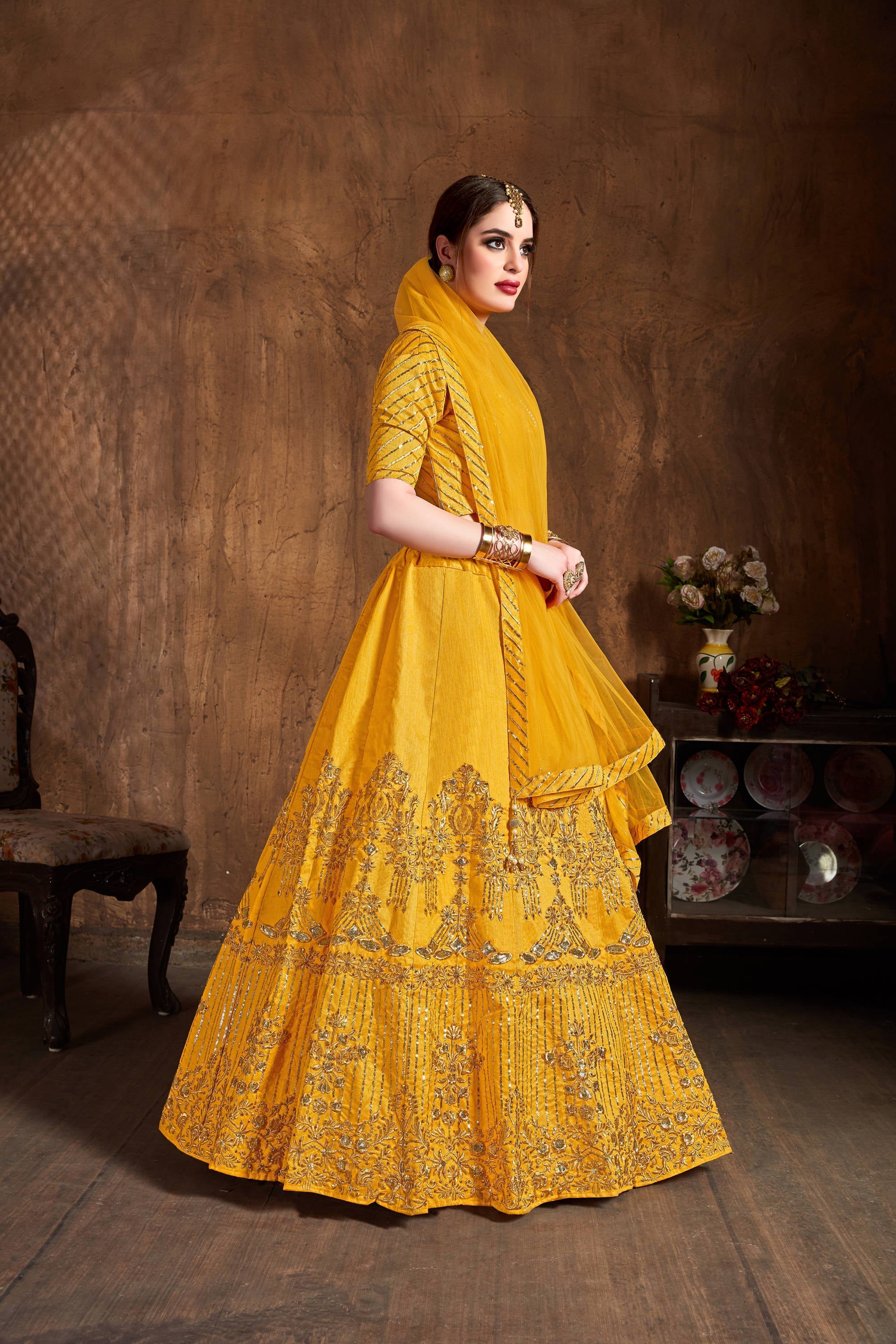 Preferable Yellow Sequins Art Silk Wedding Lehenga Choli