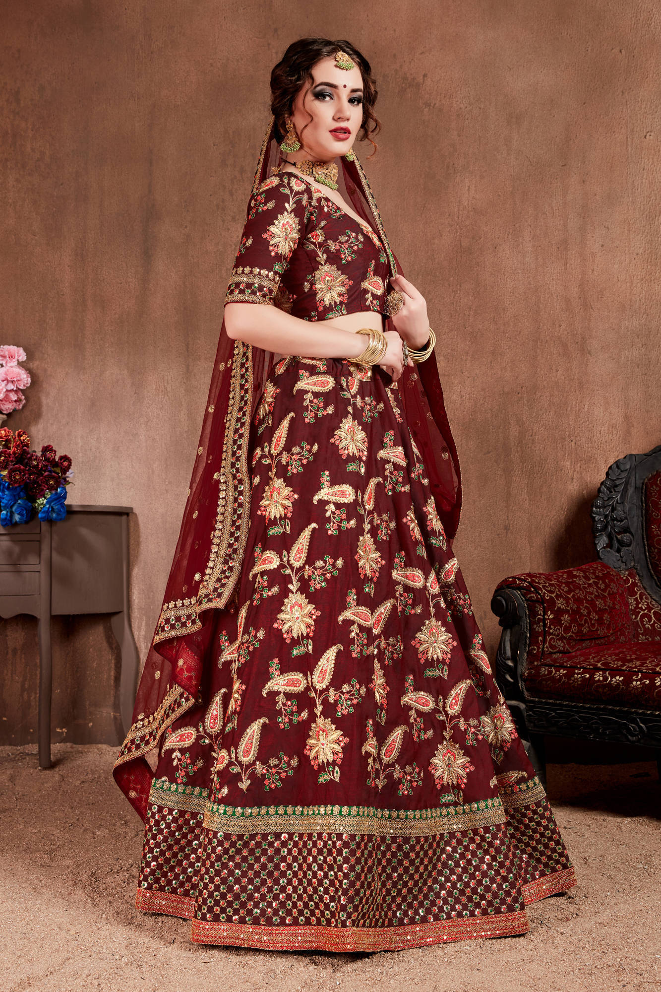 Blooming Dark Maroon Colored Bridal Wear Designer Embroidered Semi Stitched Lehenga choli