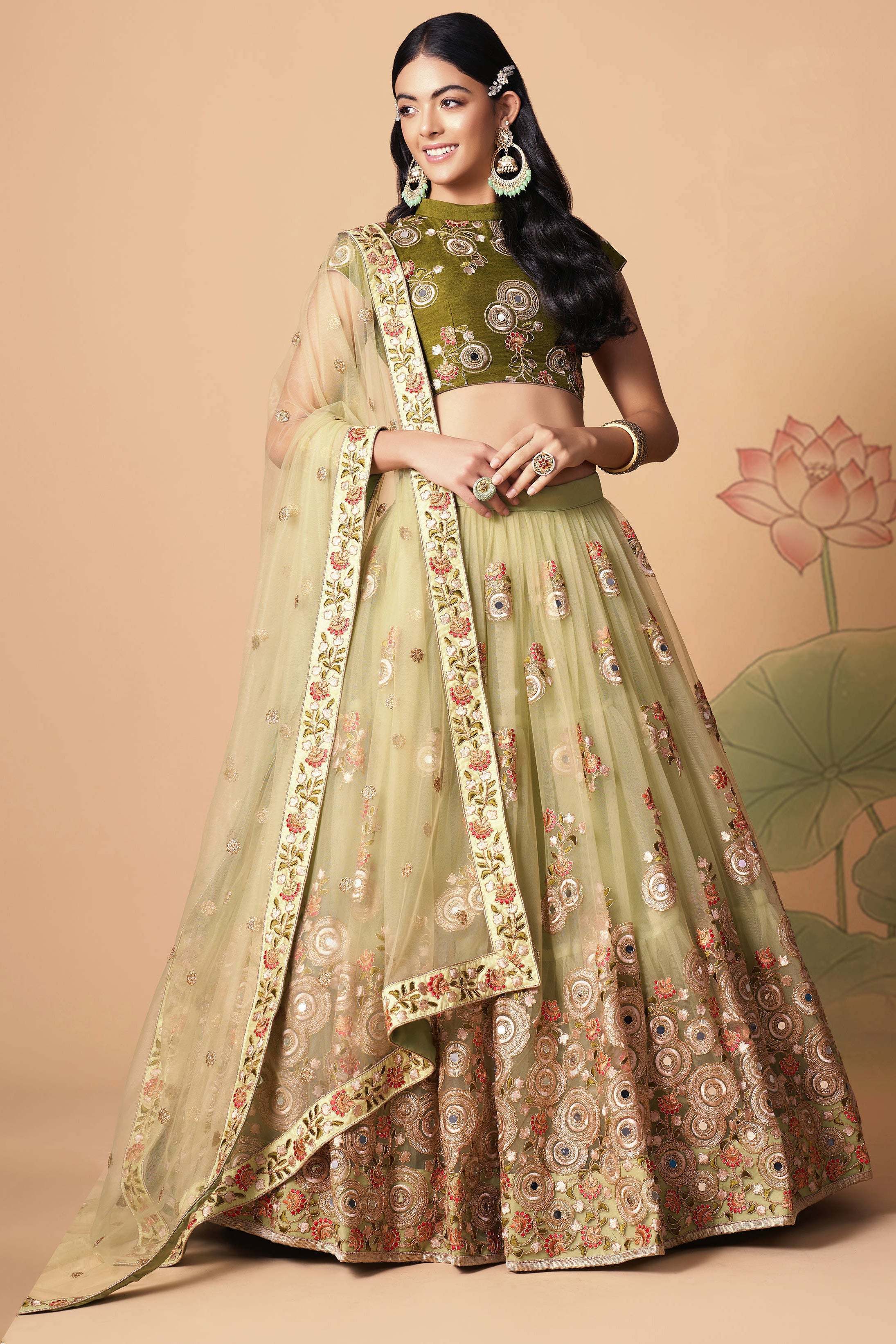 The pista green color net dupatta comes prettified with thread embroidery and sequin work.