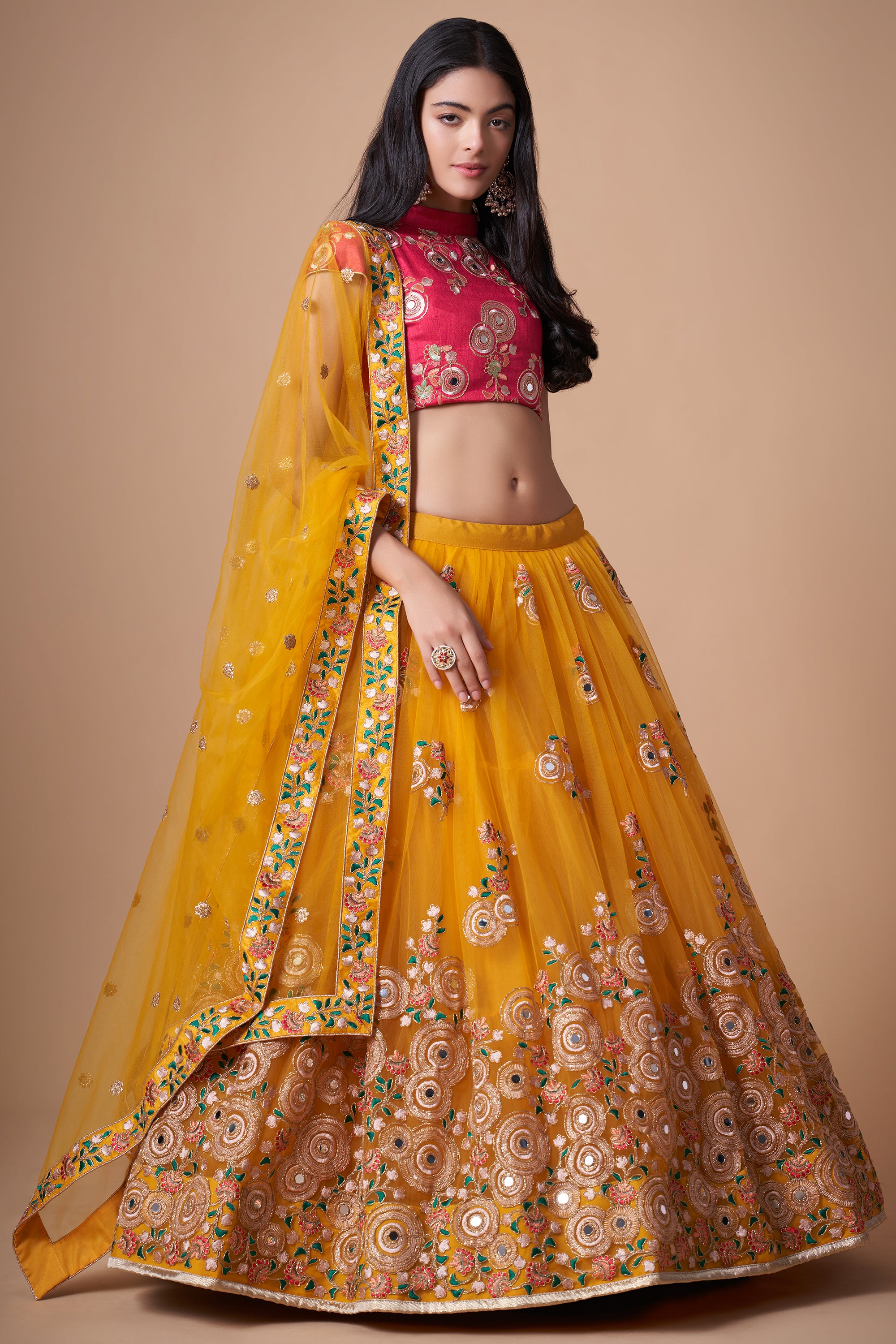Yellow Mirror Work Net Wedding Wear Lehenga Choli
